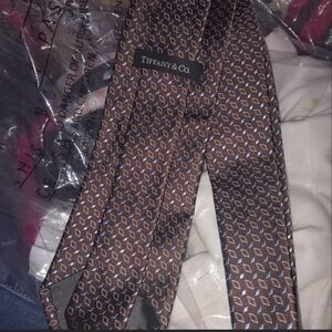 Tiffany & Co. Brown Silk Tie with Light Blue Geometric Pattern
